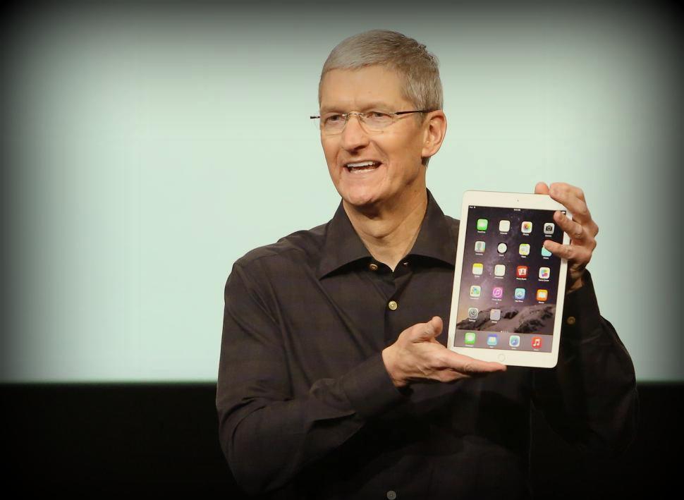 Apple CEO Tim cook with iPad air 2